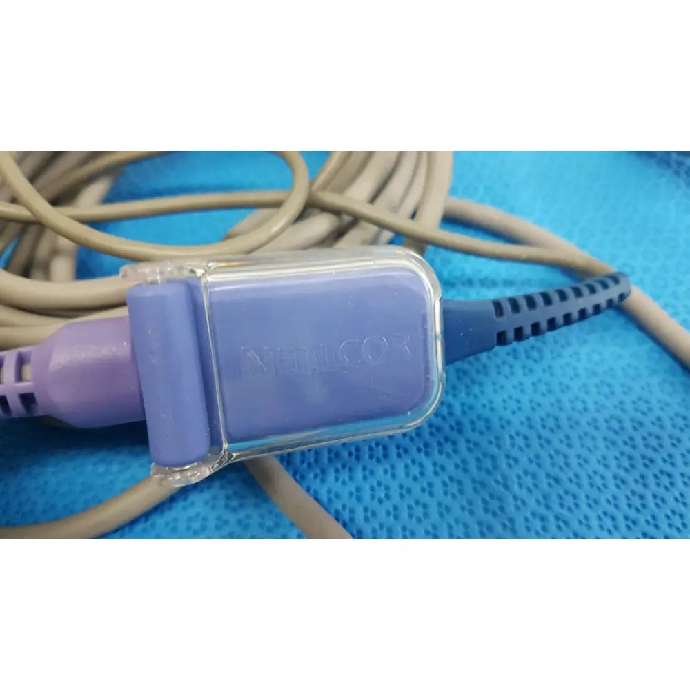 Purple and blue GE SpO2 interface cable with clear plastic housing branded atlicor for Nellcor OxiMax patient monitor