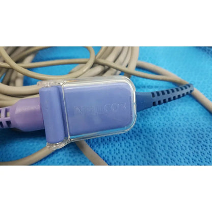 Purple and blue GE SpO2 interface cable with clear plastic housing branded atlicor for Nellcor OxiMax patient monitor