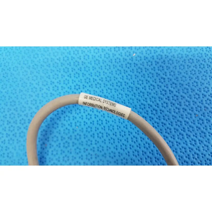 Beige spo2 interface cable with white ge medical systems label for Nellcor OxiMax 3M 10ft patient monitor use