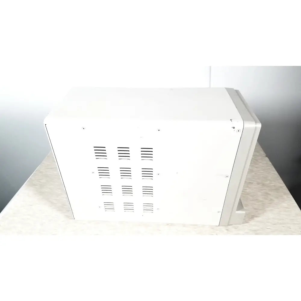 White rectangular GE tram-rac 4a module rack with side ventilation slits designed for reuse medical applications