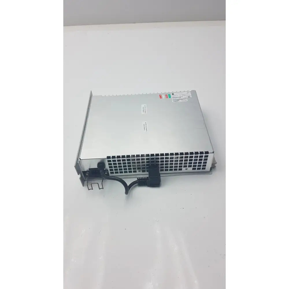 Silver metallic pro vingmed mitra dc power supply pe3159 with black ventilation grille and attached power cable