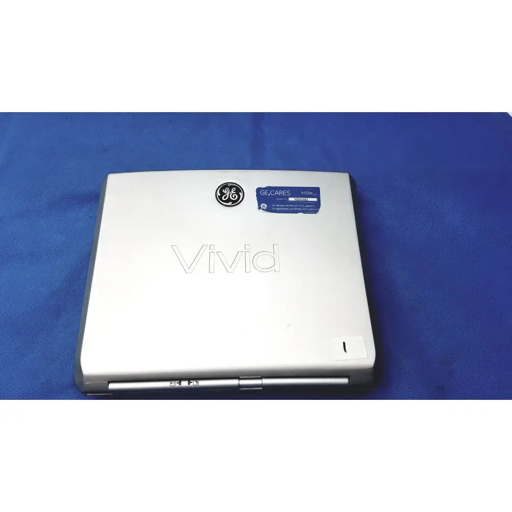Silver ge vivid portable ultrasound machine with sleek minimalist design and subtle brushed metal finish