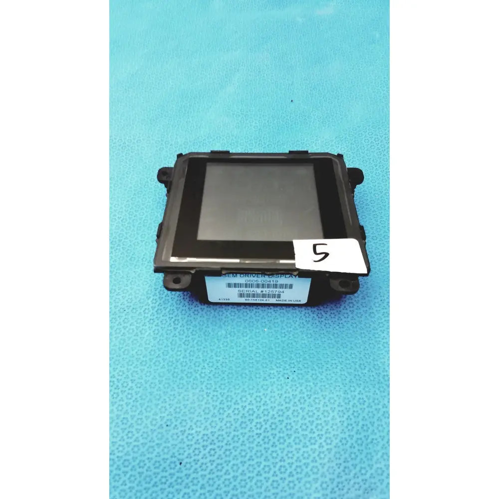 Black plastic gem driver display module with rectangular screen and mounting brackets for vehicle use serial 125794