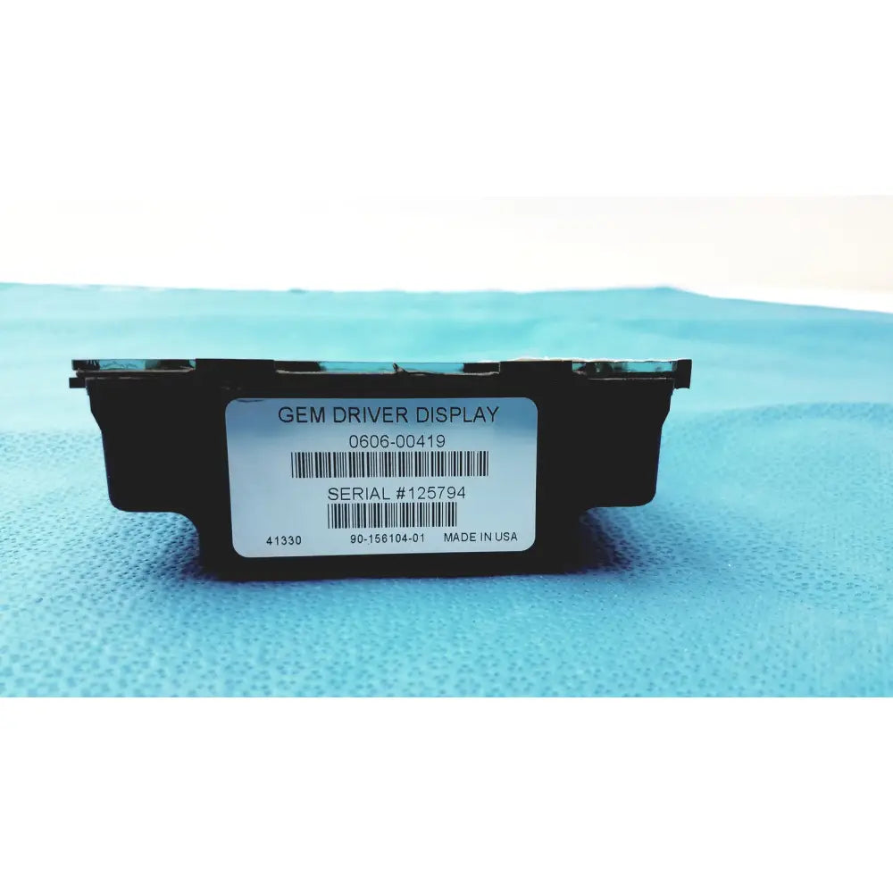 Black rectangular gem driver display with white label showing barcode and serial number made in the USA reuse medical device