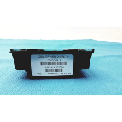 Black rectangular gem driver display with white label showing barcode and serial number made in the USA reuse medical device