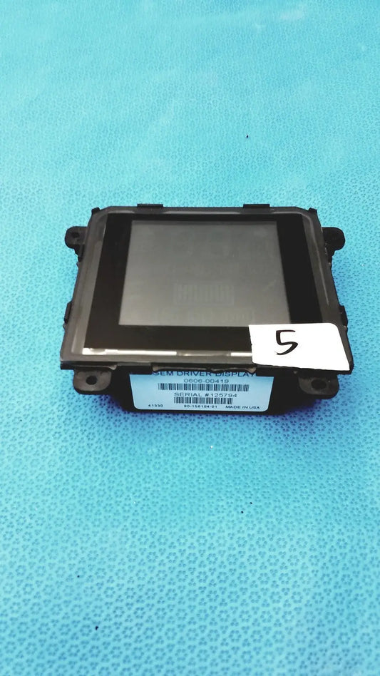 Black plastic gem driver display module with rectangular screen and mounting brackets for vehicle use serial 125794