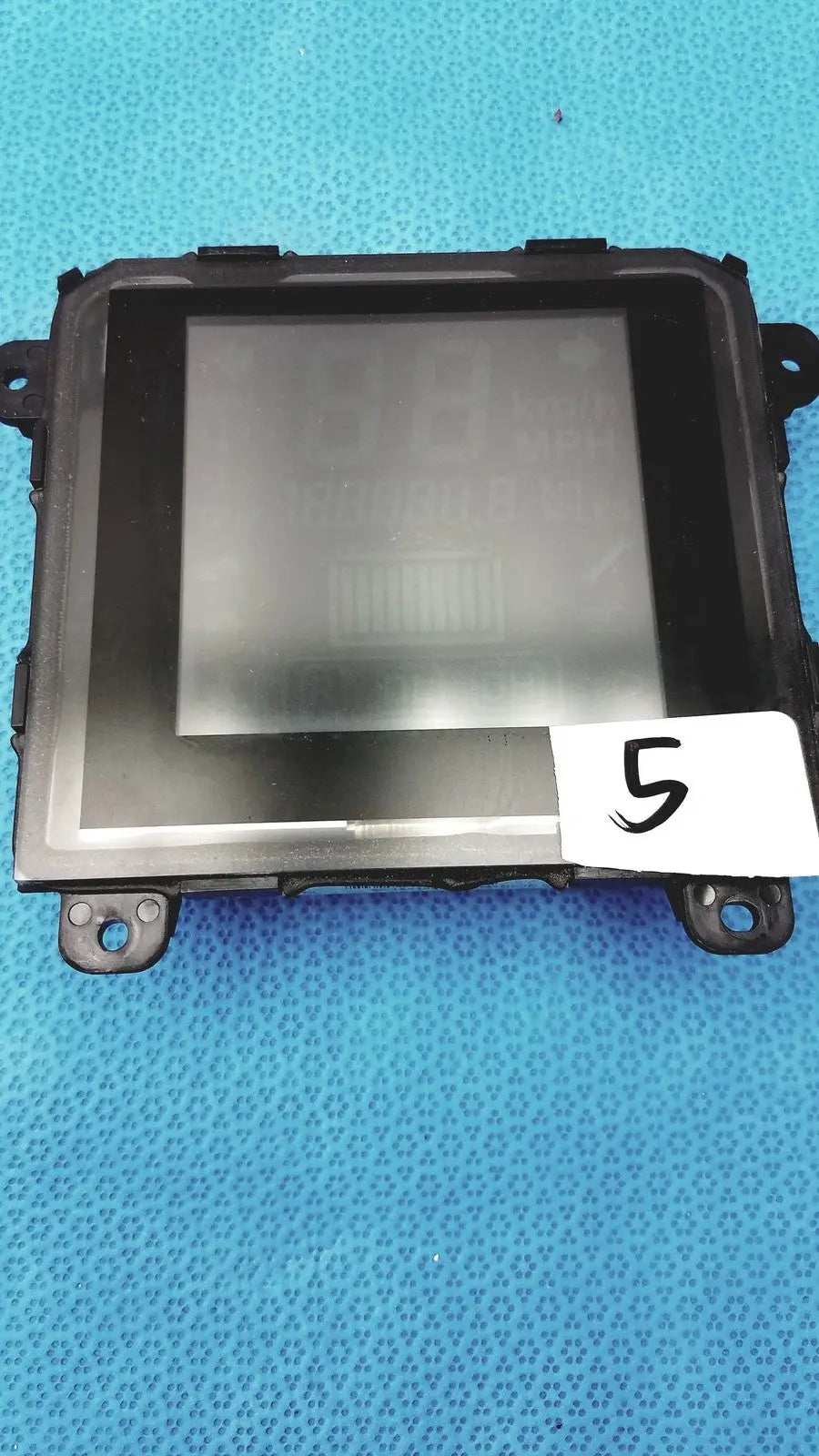 Black plastic gem driver display dashboard module with rectangular screen and mounting brackets serial 125794