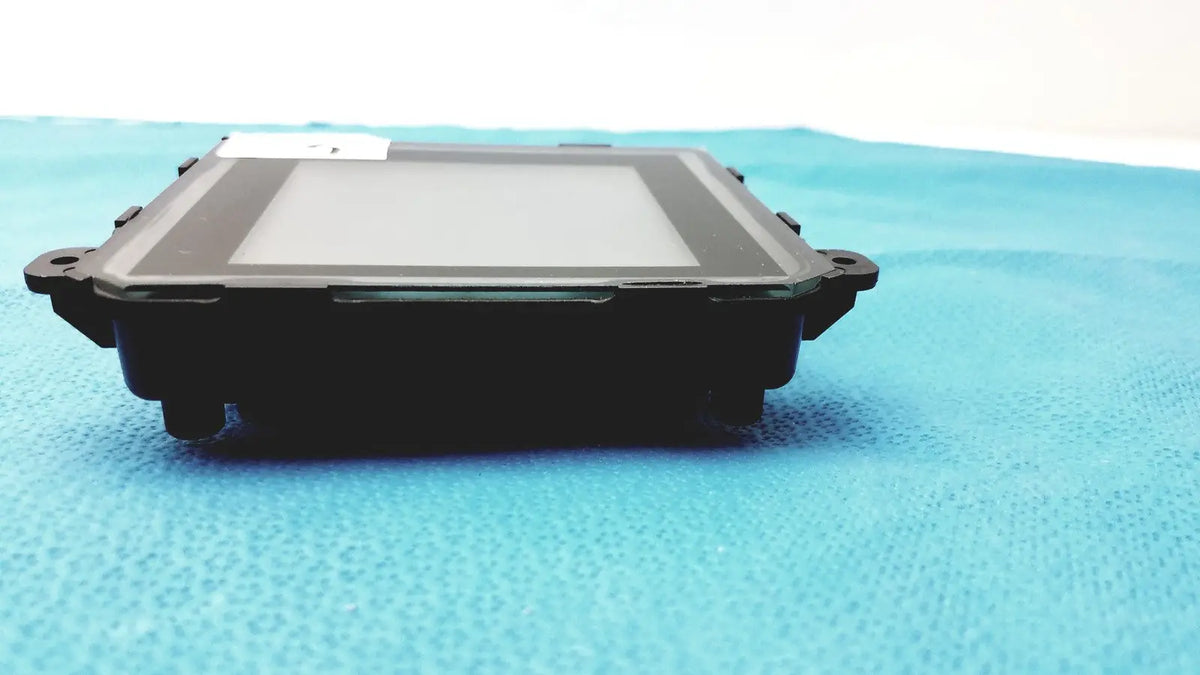 Black rectangular industrial touchscreen gem driver display with matte finish and reinforced corners for reuse medical use