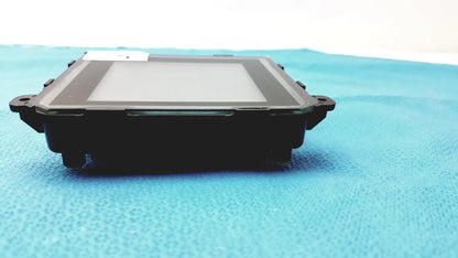 Black rectangular industrial touchscreen gem driver display with matte finish and reinforced corners for reuse medical use