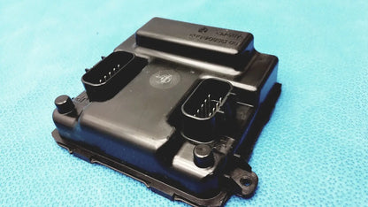 Black plastic engine control unit with two rectangular connector ports and stamped label for gem driver display reuse medical