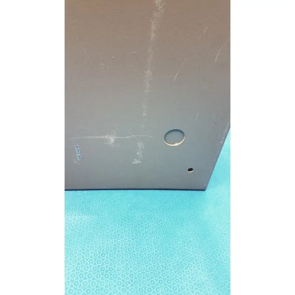 Gray metallic general purpose medium steel nema 1 enclosure with circular hole and small corner indentation