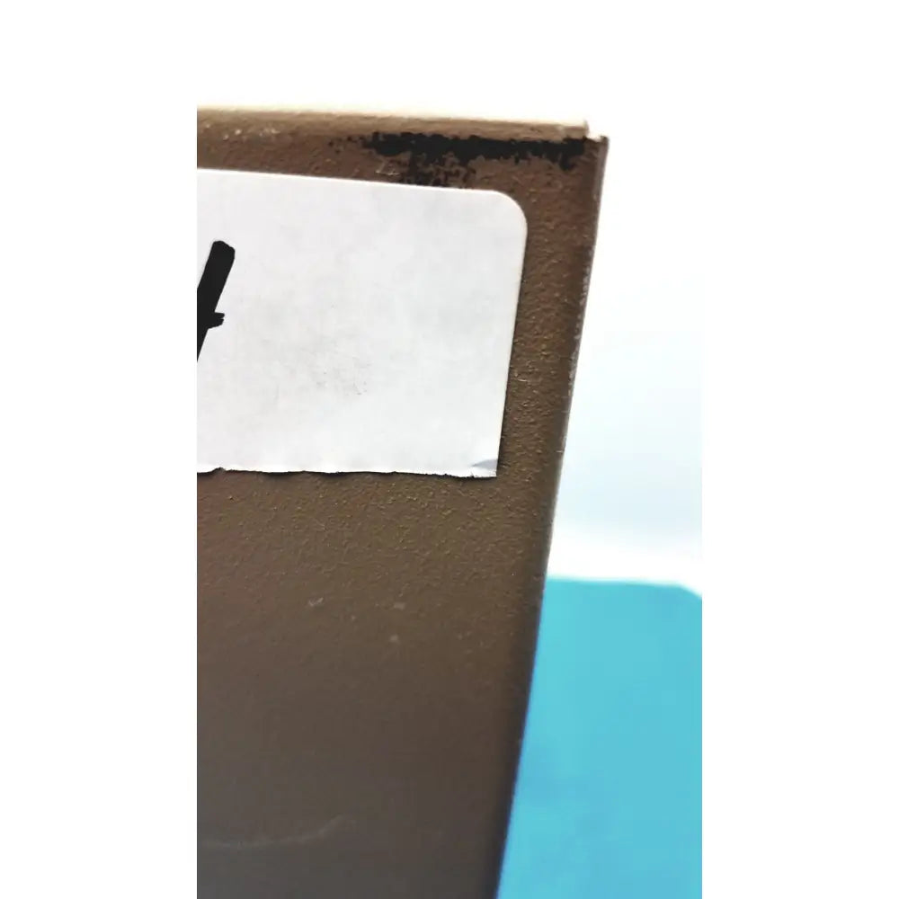Brown cardboard box corner with white label on side for general purpose medium steel nema 1 enclosure product packaging