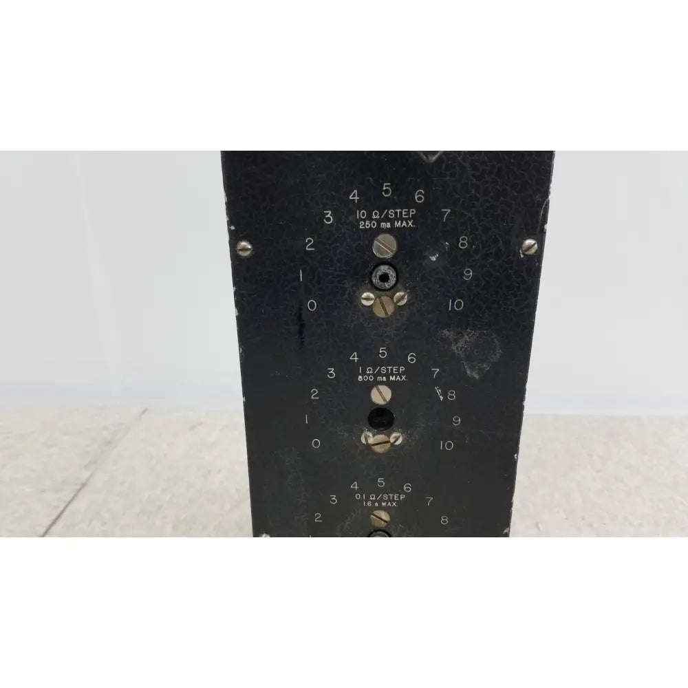 Black metal panel with three rows of numbered knobs and engraved specs on general radio radio 602-n decade resistance box