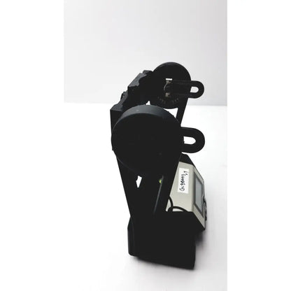 Black plastic mount holding a digital watch with white face and black bezel on gigapan epic pro robotic panohead