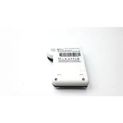 White plastic Given Imaging Inc fgs-0347 pillcam recorder with black rubberized edges and barcode label on the back side