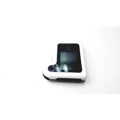 White and black pillcam recorder with rectangular screen and circular lens in sleek plastic casing for reuse medical use