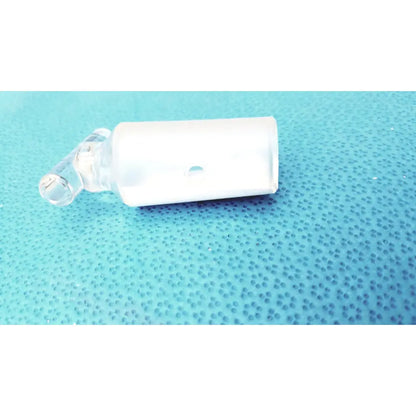 A translucent white borosilicate laboratory valve hollow stopcock with 10mm bore and clear glass stopper