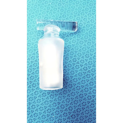 A frosted glass hollow stopcock with a clear cylindrical cap featuring a 10mm bore borosilicate laboratory valve