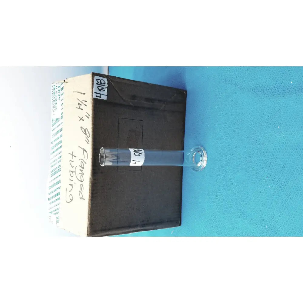 Clear glass borosilicate soil test cylinder with threaded cap and labeled fanged tubing for sedimentation analysis