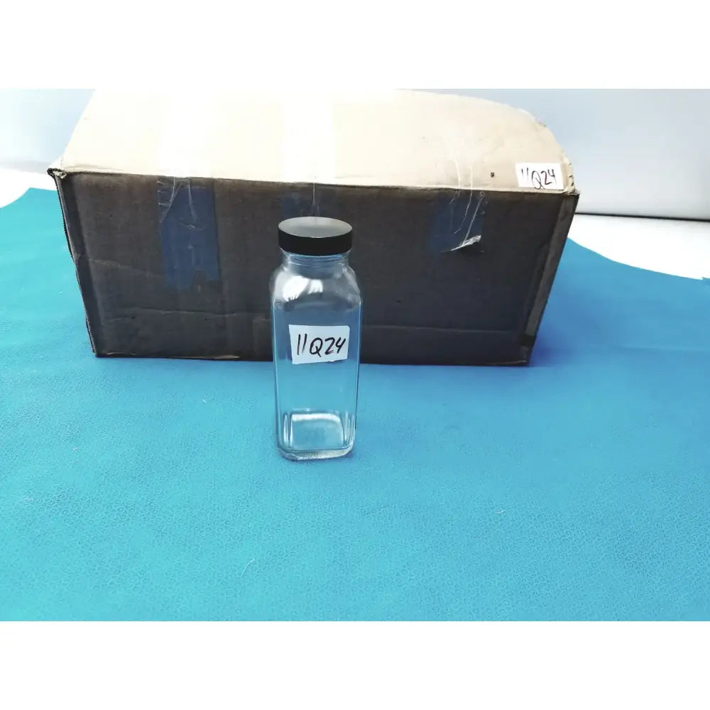 Reuse Medical Glass Bottle with Black Cap Marked “84” – Lab Container, Storage Jar Jars & Reagent Bottles, second-hand product photo 1