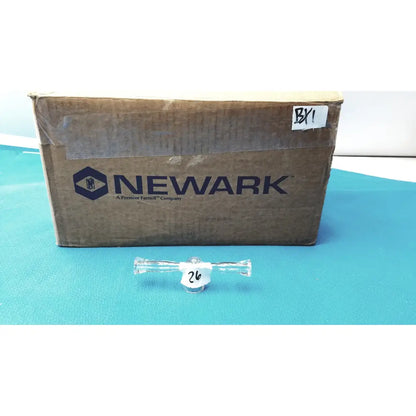 Clear glass lab stopcock adapter with 24/40 borosilicate joint and white label marked 26 with small clear cap