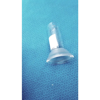 Clear plastic suction cup with white label and metallic band attached to glass lower vessel 40ml for lab glassware use