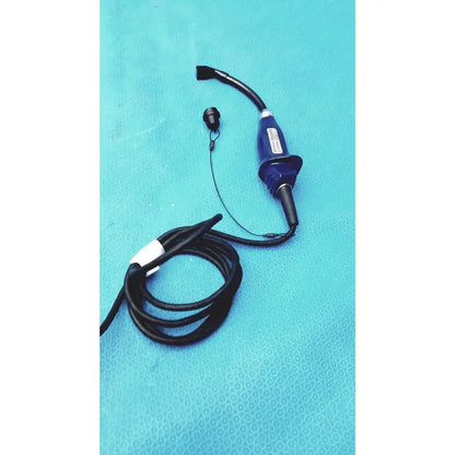 Blue medical endoscope with black flexible tubing and a small cap for glidescope video monitor an162878 use