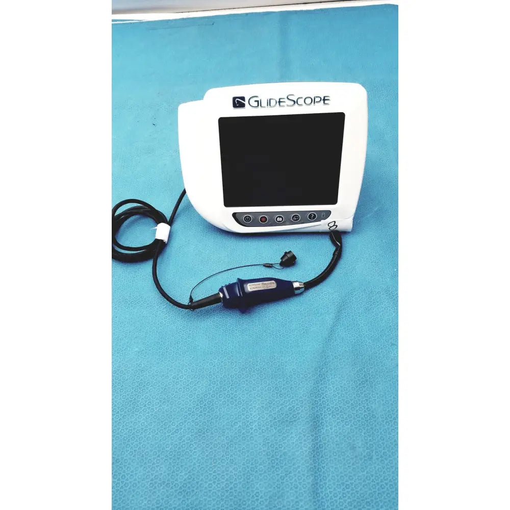 White glidescope video monitor an162878 with dark blue handheld device connected by black cables for airway management