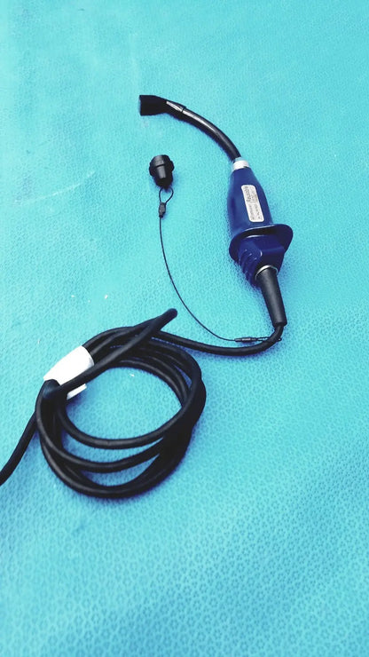 Blue medical endoscope with black flexible tubing and a small cap for glidescope video monitor an162878 use
