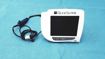 White glidescope video monitor an162878 with black screen and buttons connected to blue-handled endoscope cable