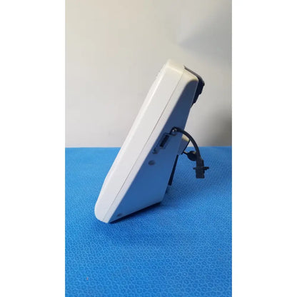 White plastic digital thermometer with black cable and connector for glidescope video monitor reuse medical applications