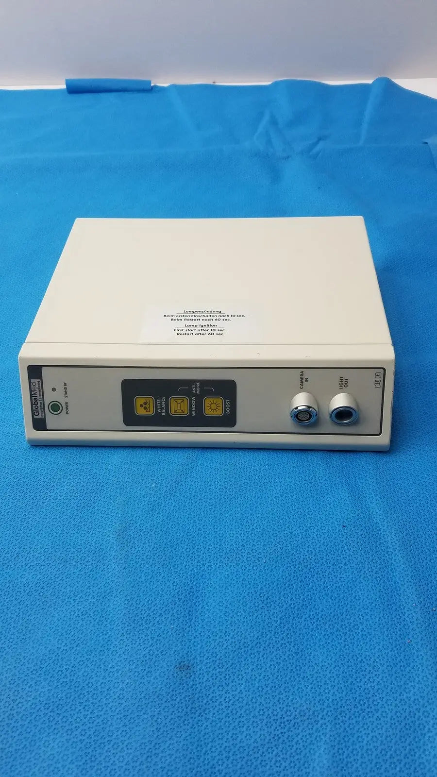 White rectangular surgical electrosurgical unit with yellow buttons and silver ports in globalmed jedmed xe30-eco model