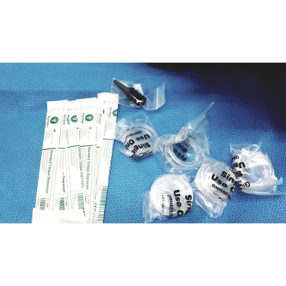 Clear plastic-wrapped single-use oral airway devices with black text labeling in globalmed telemedicine kit riester