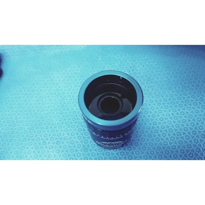 Blue cylindrical travel mug with metallic rim and dark interior included in globalmed telemedicine kit riester set