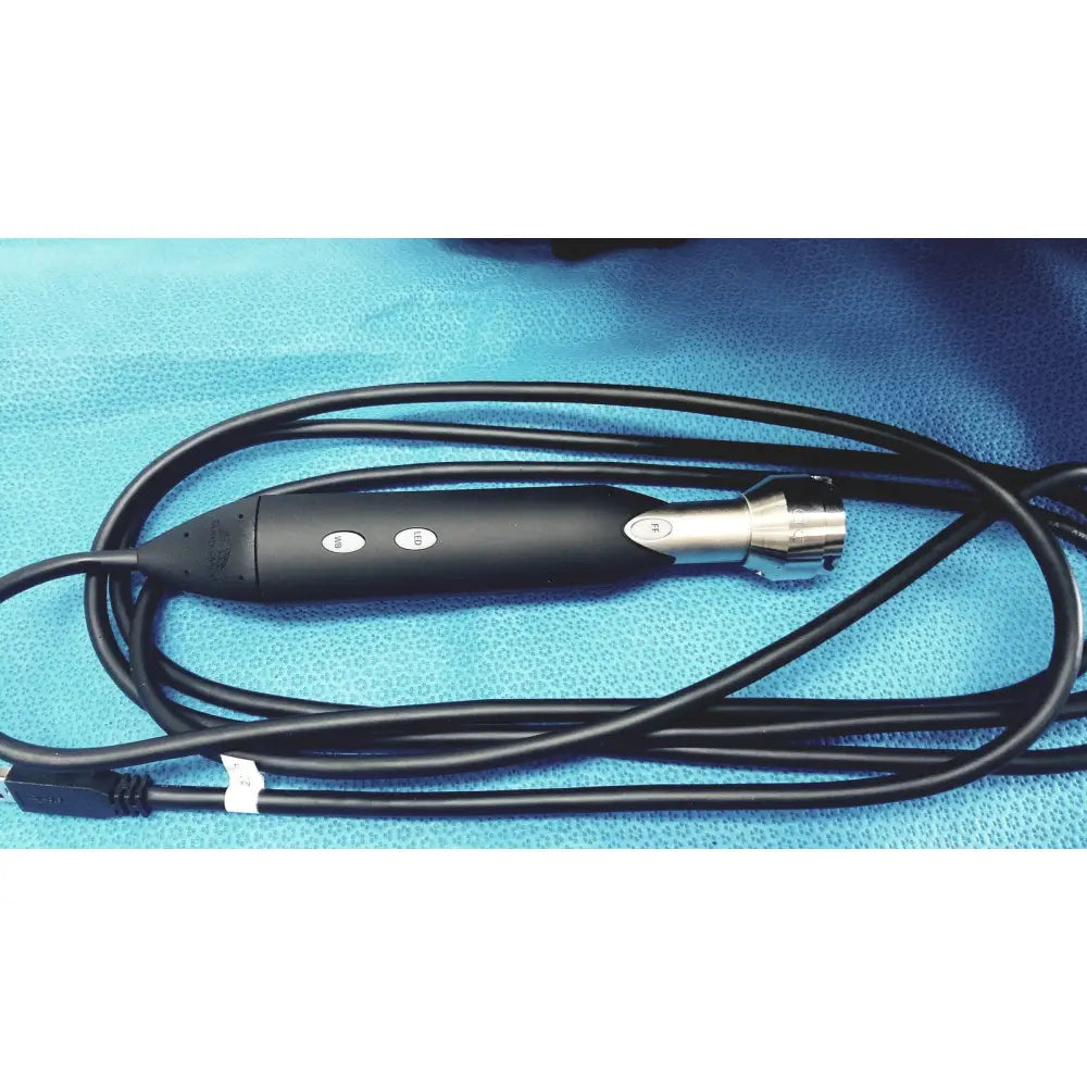 Black and silver endoscope with textured grip and control buttons from globalmed telemedicine kit riester ri-scope l ophthalmoscope
