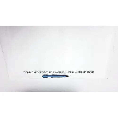 Blue pen with black tip and silver clip on white paper background for globalmedia totalexam handheld medical use