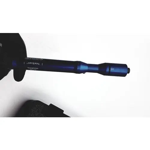 A sleek deep blue matte tactical flashlight with engraved markings for globalmedia totalexam handheld medical use