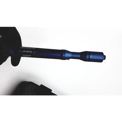 A sleek deep blue matte tactical flashlight with engraved markings for globalmedia totalexam handheld medical use
