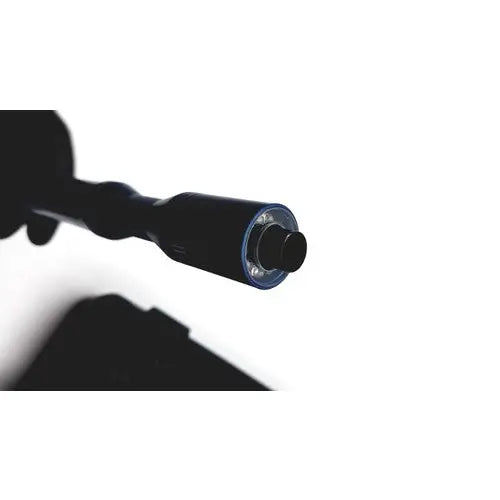 Black cylindrical usb-c connector with metallic ring accent on the globalmedia totalexam handheld medical examination device