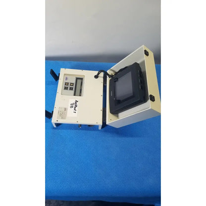 Beige industrial control unit with black sony monitor in open hinged enclosure by gms general microwave services c f band receiver