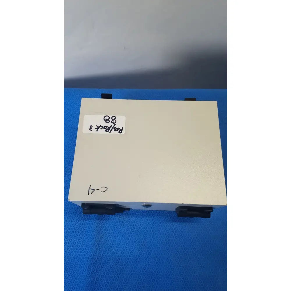 Beige rectangular gms general microwave c/f-band 6.2-6.8 ghz receiver monitor with black mounting brackets and side port