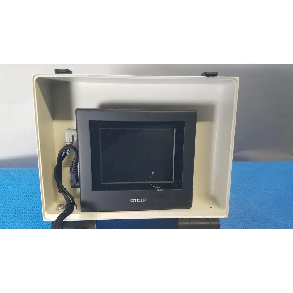 Black digital display screen in beige protective casing of gms general microwave c f band 6.2 6.8 ghz receiver monitor