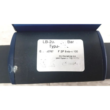 Dark blue cylindrical portable light bar with white label lb-20 made by gn otometrics a/s for portable light use