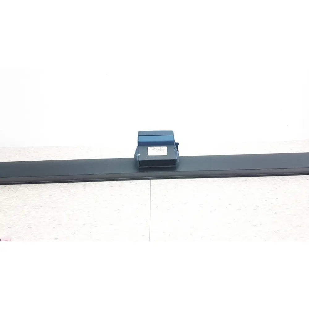 Blue and black portable light bar GN Otometrics LB-200 with rectangular body and small front label