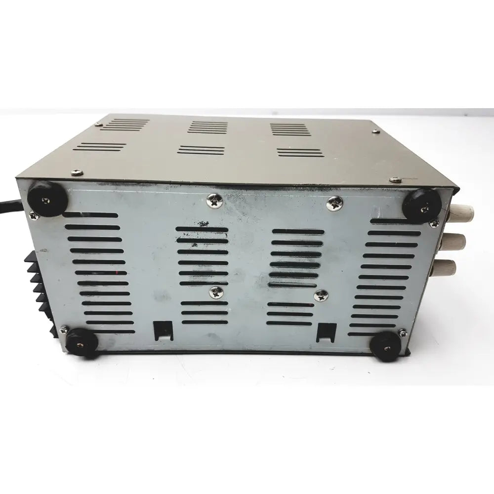 Silver metallic goldstar dc power supply gp 303 with black rubber feet and ventilation slits for reuse medical use