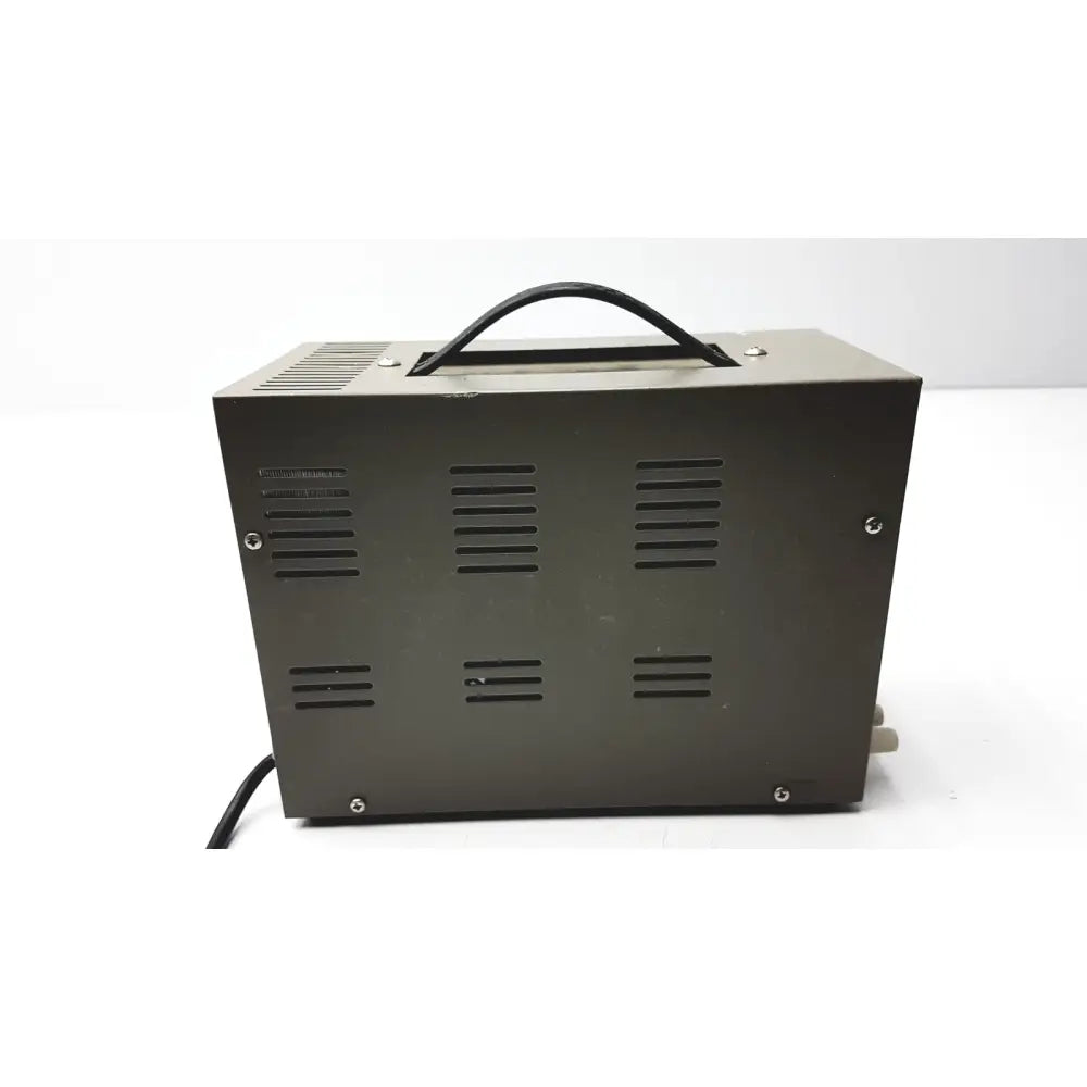 Black rectangular goldstar dc power supply gp 303 with handle and ventilation slits ideal for reuse medical purposes