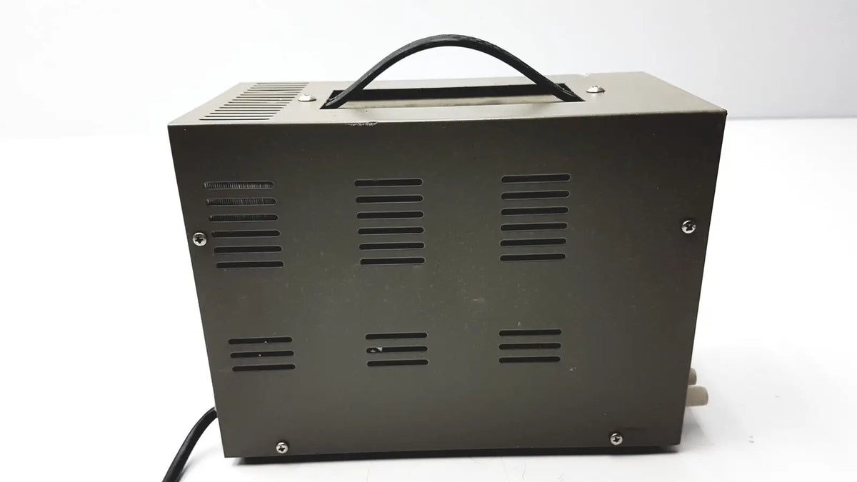 Black rectangular goldstar dc power supply gp 303 with handle and ventilation slits ideal for reuse medical purposes