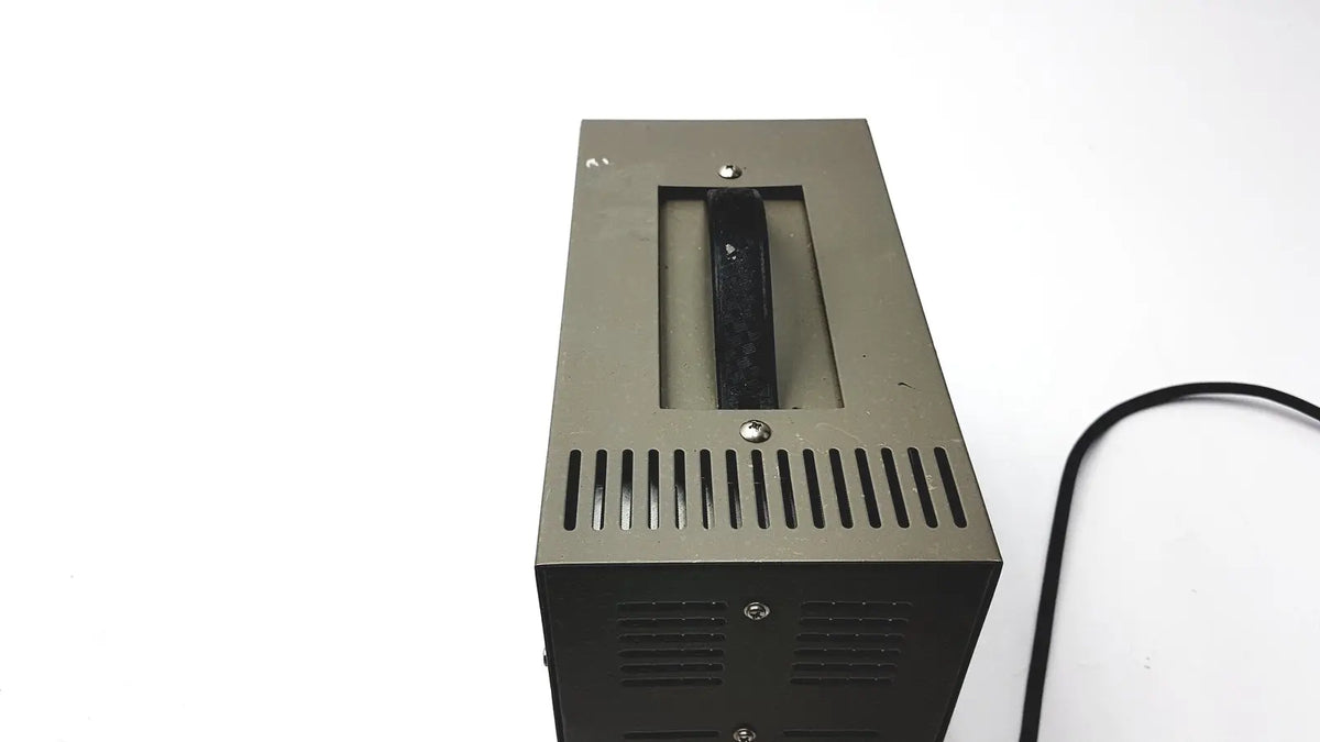 Black rectangular goldstar dc power supply unit gp 303 with matte finish and vertical ventilation slits for reuse medical applications