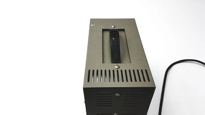 Black rectangular goldstar dc power supply unit gp 303 with matte finish and vertical ventilation slits for reuse medical applications
