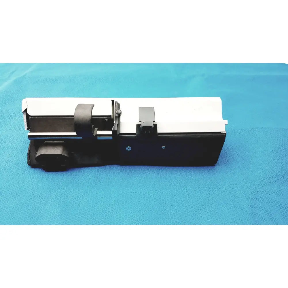 Black and white industrial syringe delivery device clean with metallic accents for device clean medical use graseby 3100